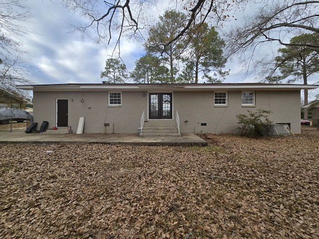 rear view of property featuring a patio area