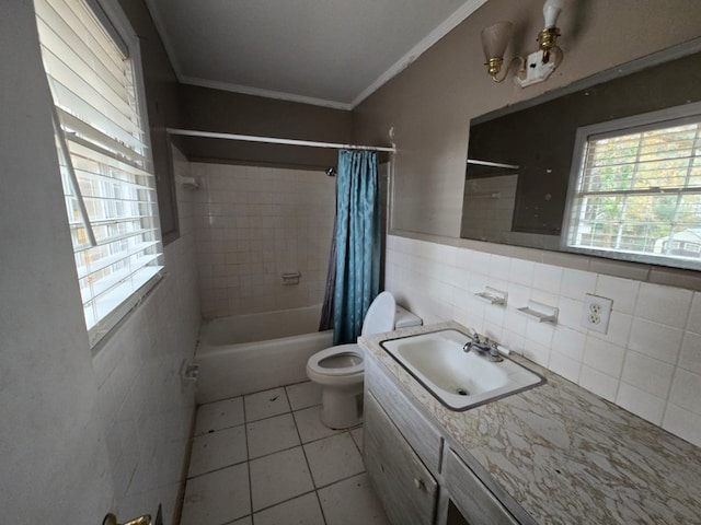 full bathroom featuring shower / tub combo with curtain, crown molding, tile patterned flooring, tile walls, and toilet