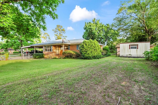 902 Moss St, Dothan, AL 36301 - view of yard with a carport