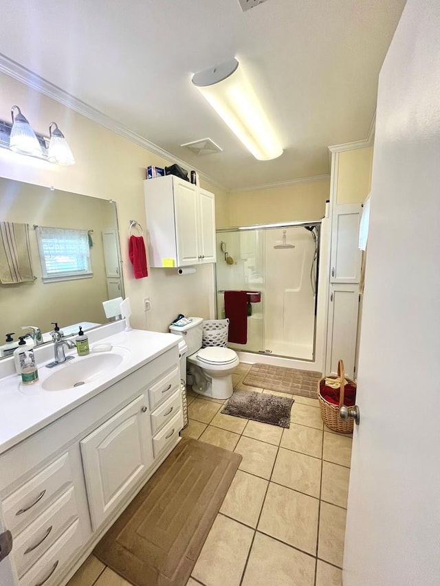 449 County Road 112, Columbia, AL 36319 - bathroom featuring ornamental molding, tile patterned floors, a shower stall, vanity, and toilet