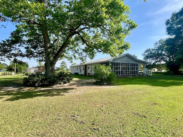 449 County Road 112, Columbia, AL 36319 - view of grassy yard with a sunroom