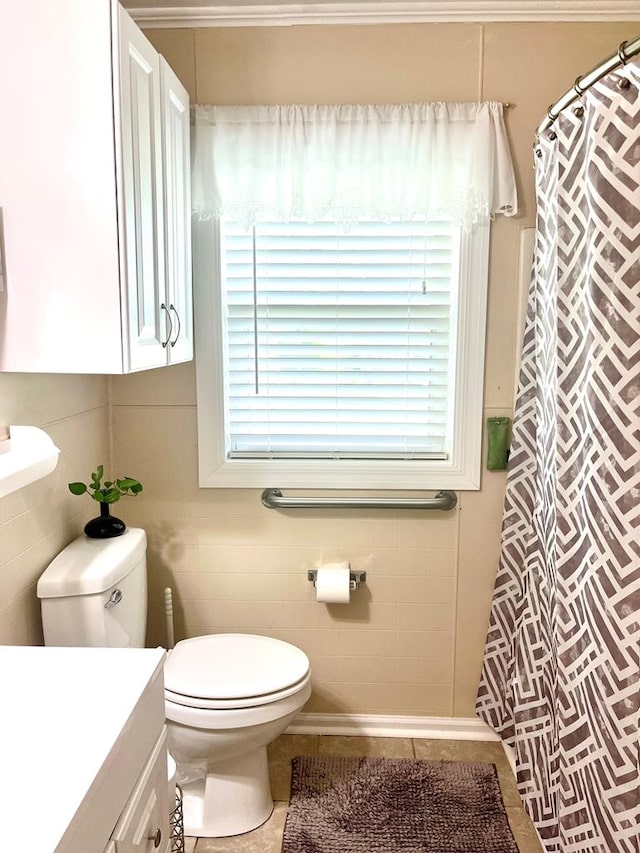 449 County Road 112, Columbia, AL 36319 - full bathroom featuring tile walls, toilet, tile patterned floors, vanity, and a shower with shower curtain