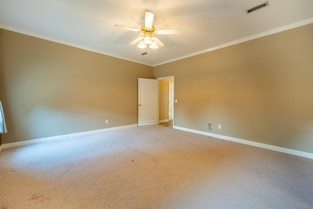 401 Dunleith Blvd, Dothan, AL 36303 - spare room with baseboards, a ceiling fan, ornamental molding, and light carpet