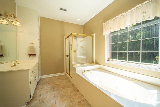 401 Dunleith Blvd, Dothan, AL 36303 - bathroom featuring a stall shower, vanity, a whirlpool tub, and baseboards