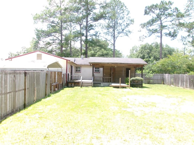 934 Sunset Blvd, Elba, AL 36323 - back of house with a wooden deck and a fenced backyard