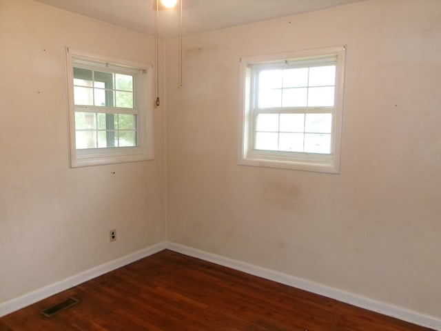 934 Sunset Blvd, Elba, AL 36323 - spare room with dark wood-type flooring
