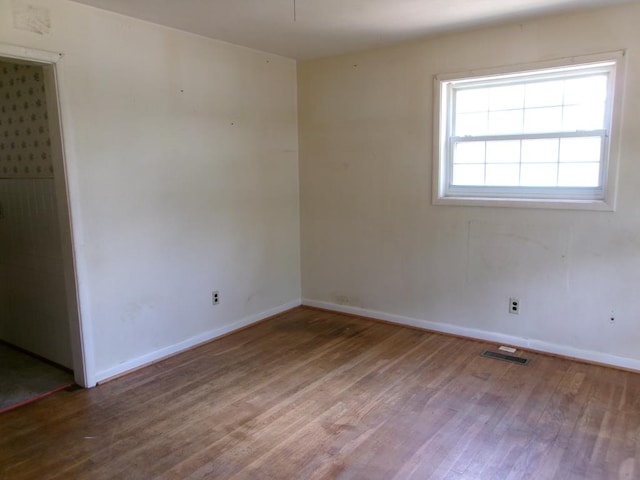 934 Sunset Blvd, Elba, AL 36323 - spare room with wood finished floors and baseboards