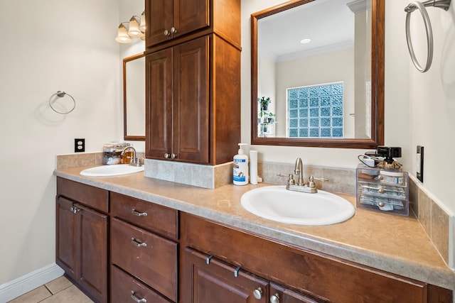 115 Brittany Dr, Dothan, AL 36301 - bathroom with double vanity, tile patterned floors, and crown molding