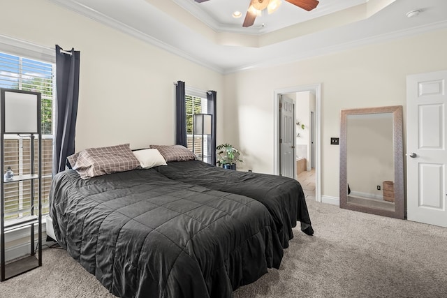 115 Brittany Dr, Dothan, AL 36301 - bedroom with multiple windows, carpet, ornamental molding, a tray ceiling, and ensuite bathroom