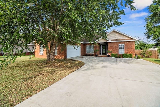 115 Brittany Dr, Dothan, AL 36301 - view of front facade featuring concrete driveway, brick siding, and an attached garage