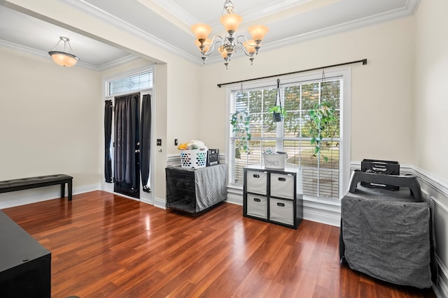 115 Brittany Dr, Dothan, AL 36301 - living area with a chandelier, healthy amount of natural light, wood finished floors, ornamental molding, and a raised ceiling