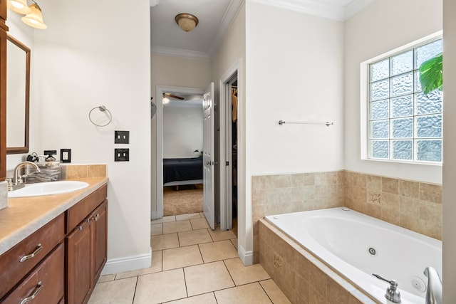 115 Brittany Dr, Dothan, AL 36301 - full bath with ensuite bathroom, vanity, a tub with jets, tile patterned floors, and ornamental molding