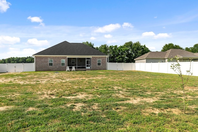 1908 Baxter Rd, Ashford, AL 36312 - back of property with a fenced backyard and brick siding