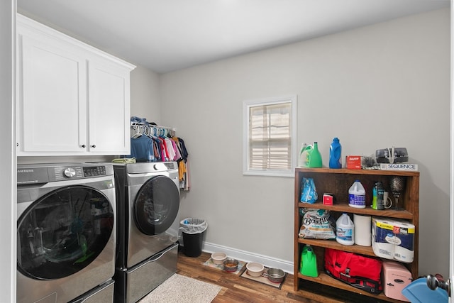 1908 Baxter Rd, Ashford, AL 36312 - laundry area with washing machine and dryer, wood finished floors, and cabinet space