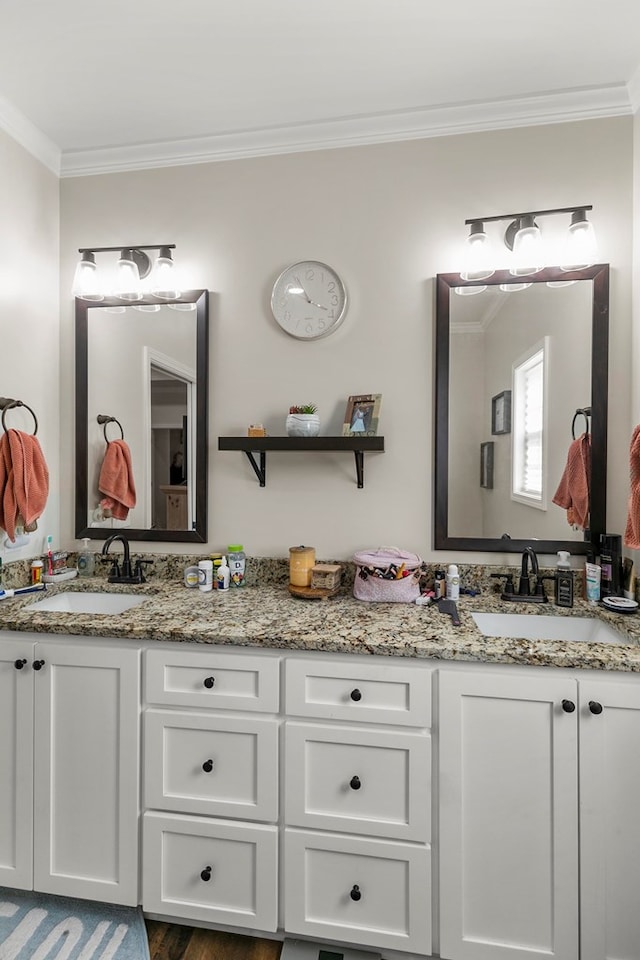 1908 Baxter Rd, Ashford, AL 36312 - bathroom featuring ornamental molding, double vanity, and wood finished floors
