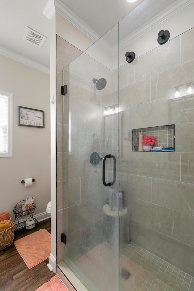1908 Baxter Rd, Ashford, AL 36312 - bathroom featuring wood finished floors, a shower stall, and ornamental molding