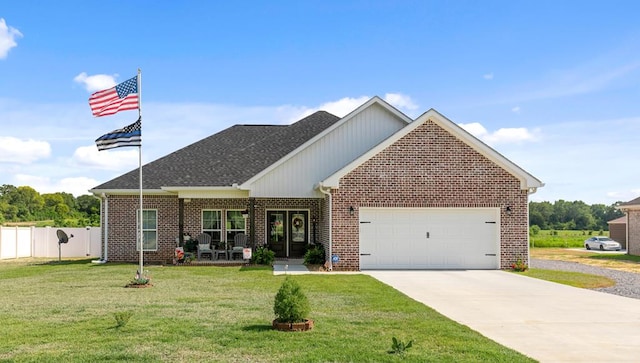 1908 Baxter Rd, Ashford, AL 36312 - view of front of home featuring concrete driveway, a garage, brick siding, and roof with shingles