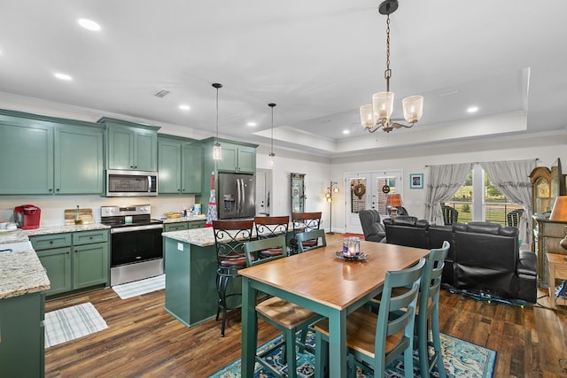 1908 Baxter Rd, Ashford, AL 36312 - dining space featuring crown molding, a raised ceiling, dark wood-type flooring, a chandelier, and recessed lighting