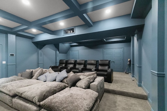 cinema room featuring beamed ceiling, baseboards, coffered ceiling, and light carpet