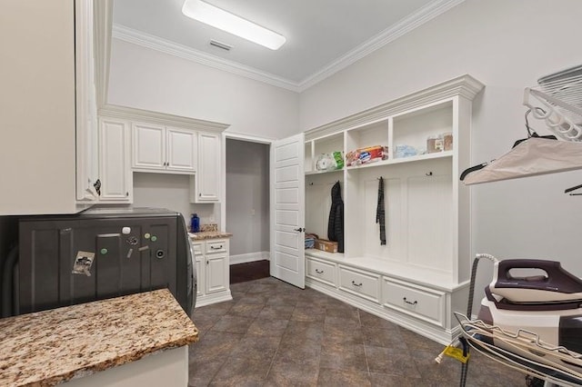 mudroom with visible vents, baseboards, and ornamental molding