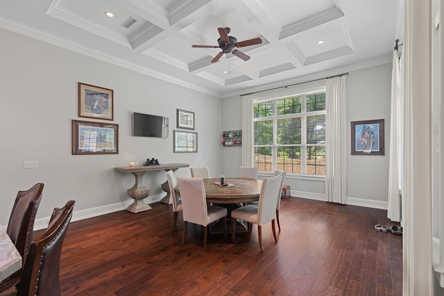 dining room featuring beamed ceiling, crown molding, baseboards, and wood finished floors