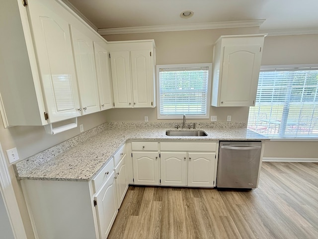 kitchen featuring a sink, white cabinets, light wood-type flooring, and dishwasher