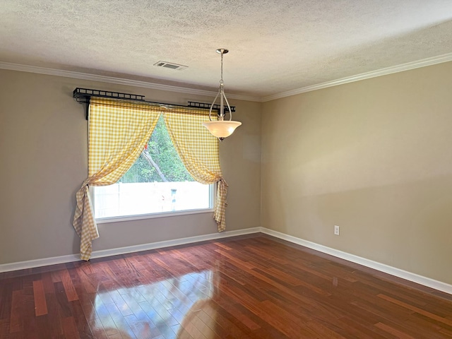 26 Goff St, Daleville, AL 36322 - spare room with hardwood / wood-style floors, a textured ceiling, and ornamental molding