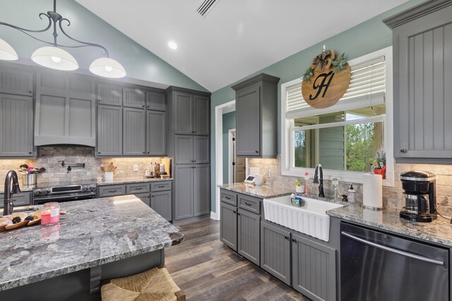 333 County Road 271, Clopton, AL 36317 - kitchen featuring pendant lighting, sink, vaulted ceiling, decorative backsplash, and appliances with stainless steel finishes