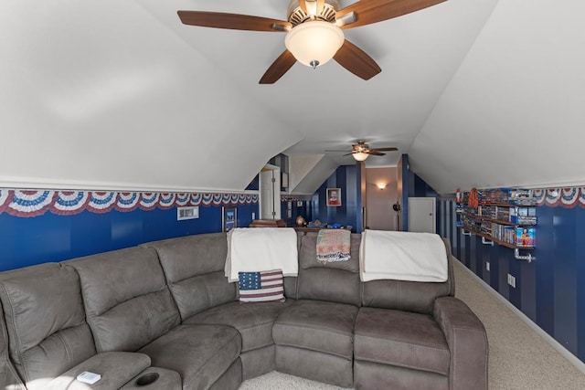 carpeted living room with ceiling fan and lofted ceiling