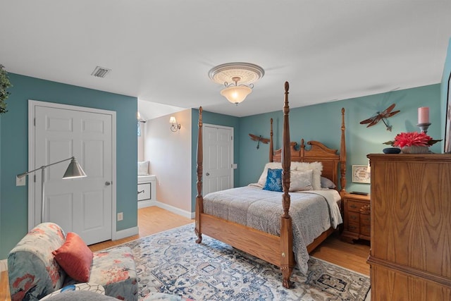 bedroom featuring light hardwood / wood-style floors