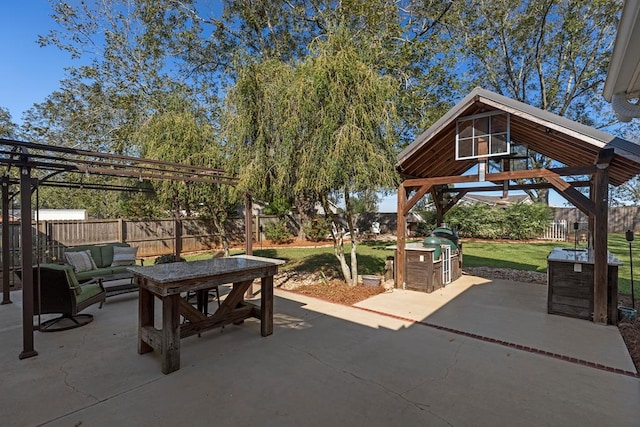 view of patio featuring a gazebo, a grill, and an outdoor hangout area