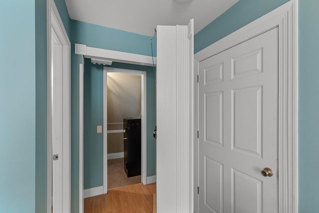 hallway featuring light hardwood / wood-style floors