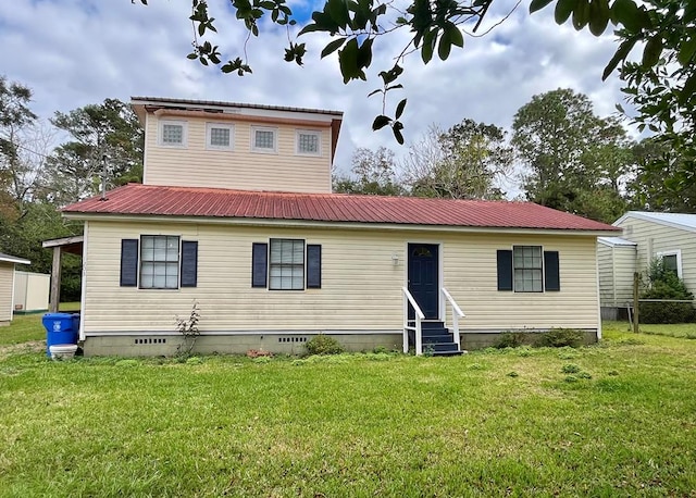 view of front facade with a front yard