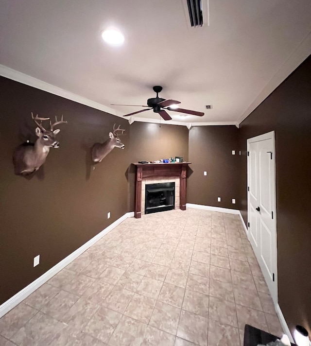 unfurnished living room with ceiling fan and ornamental molding