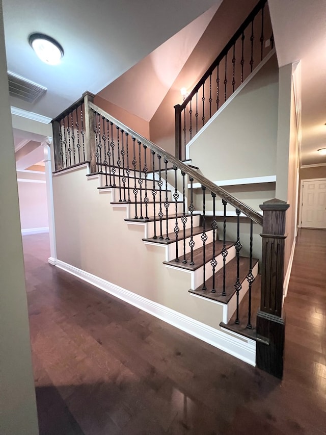 stairs with wood-type flooring