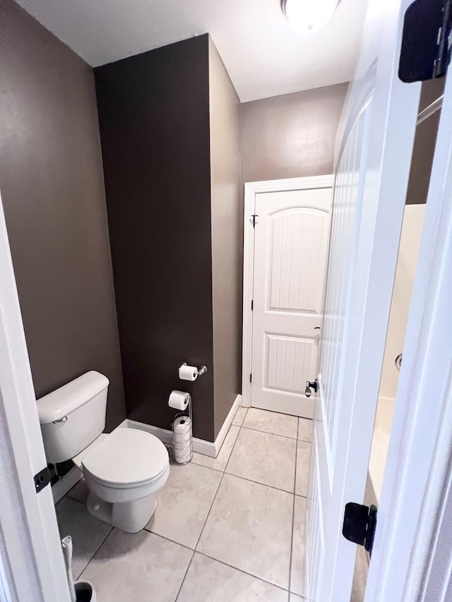 bathroom featuring tile patterned floors and toilet