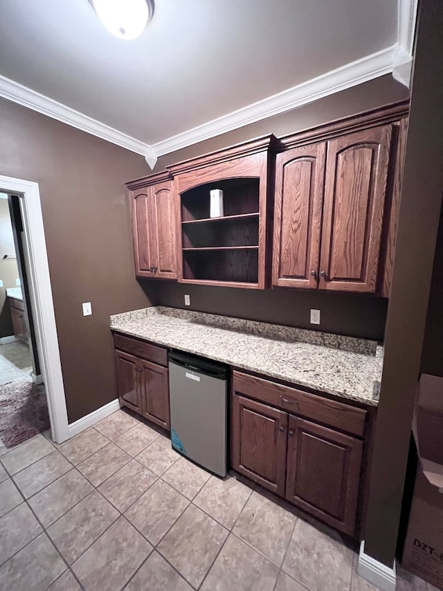 kitchen featuring light tile patterned floors, stainless steel dishwasher, dark brown cabinets, and ornamental molding