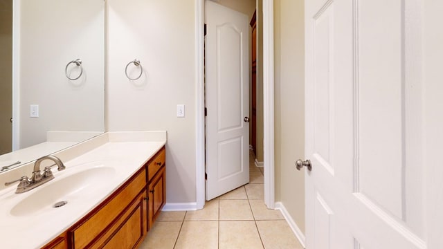 bathroom featuring tile patterned floors and vanity