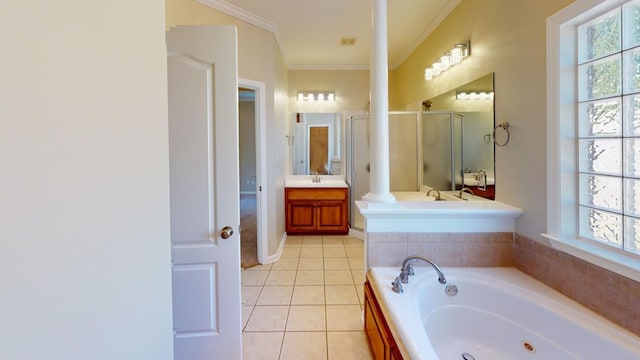 bathroom with tile patterned floors, decorative columns, crown molding, vanity, and independent shower and bath