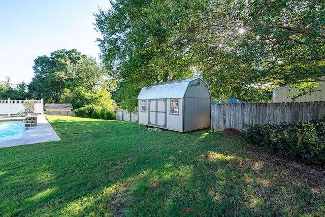 view of yard featuring a patio and a storage unit