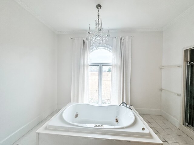 2023 J Saunders Rd, Dothan, AL 36305 - full bath featuring a tub with jets, ornamental molding, tile patterned flooring, a chandelier, and baseboards