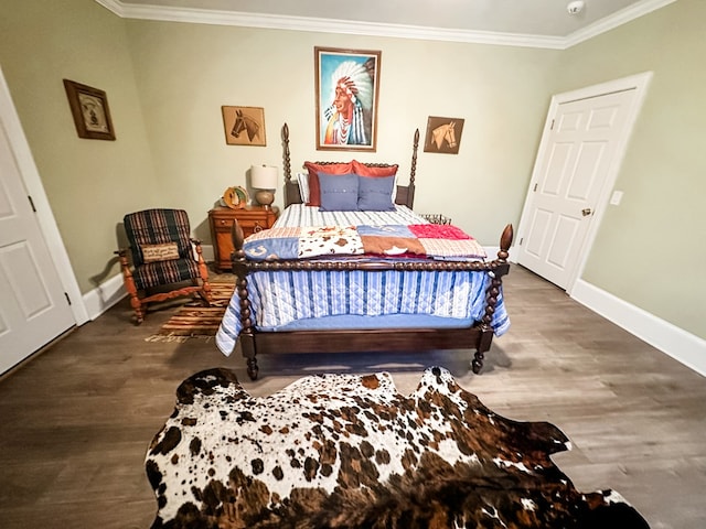 2023 J Saunders Rd, Dothan, AL 36305 - bedroom featuring crown molding, baseboards, and wood finished floors