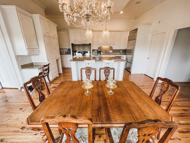 2023 J Saunders Rd, Dothan, AL 36305 - dining room featuring ornamental molding, light wood-style floors, a chandelier, and recessed lighting