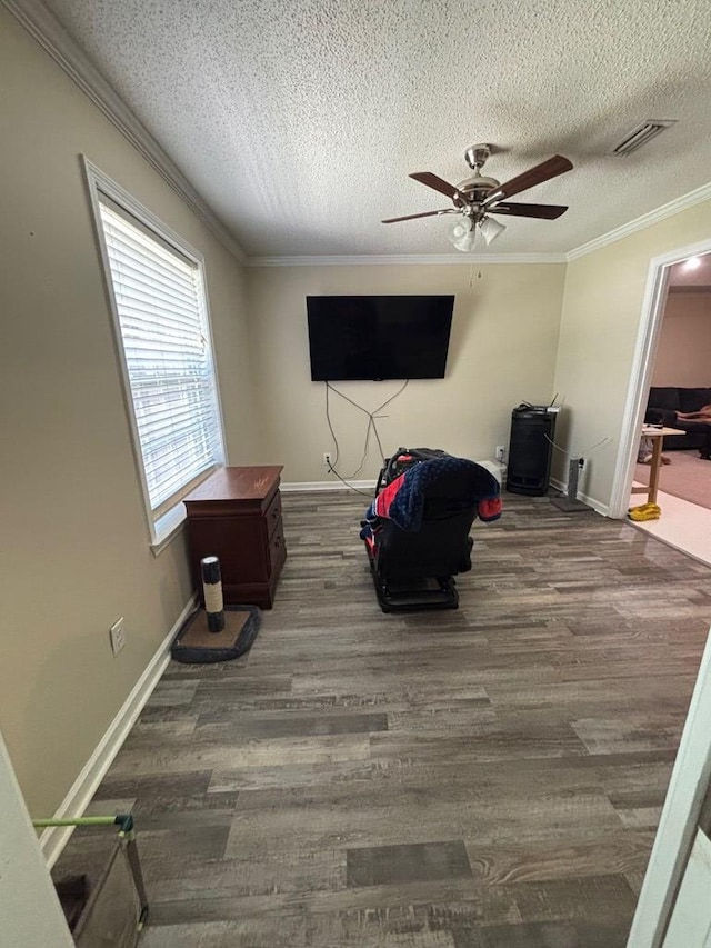 112 Vixen Ct, Dothan, AL 36305 - living room with crown molding, wood finished floors, a ceiling fan, and a textured ceiling