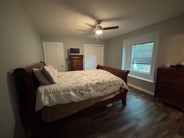 112 Vixen Ct, Dothan, AL 36305 - bedroom with dark wood-type flooring, a textured ceiling, ceiling fan, and a closet