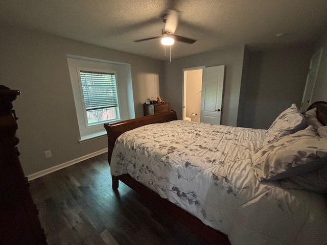 112 Vixen Ct, Dothan, AL 36305 - bedroom featuring dark wood-style floors, ceiling fan, and a textured ceiling