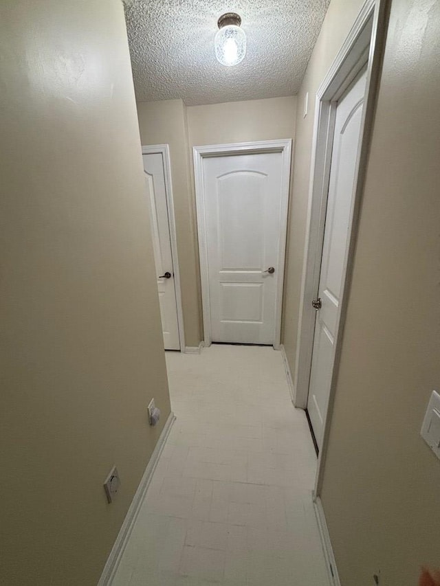 112 Vixen Ct, Dothan, AL 36305 - hall with a textured ceiling and light flooring