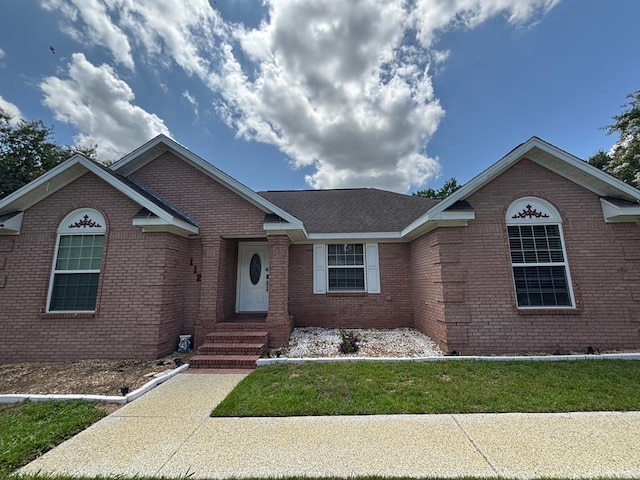 112 Vixen Ct, Dothan, AL 36305 - single story home with entry steps, brick siding, and a front yard