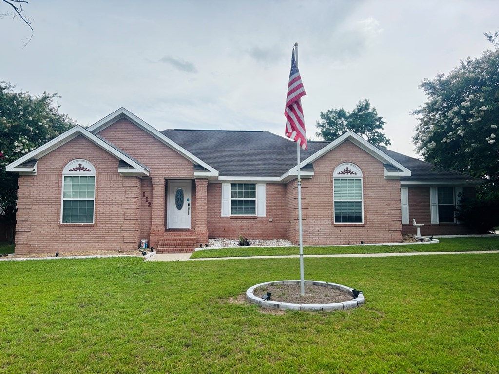 112 Vixen Ct, Dothan, AL 36305 - single story home featuring brick siding, a front lawn, entry steps, and a shingled roof