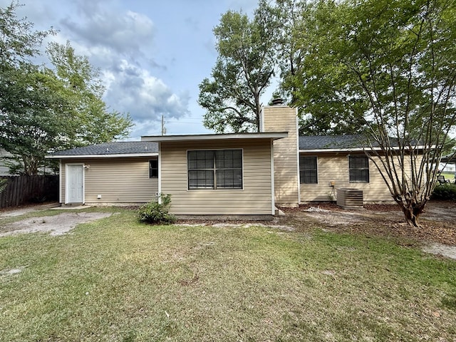 2419 Creekwood Dr, Dothan, AL 36301 - rear view of property featuring a chimney